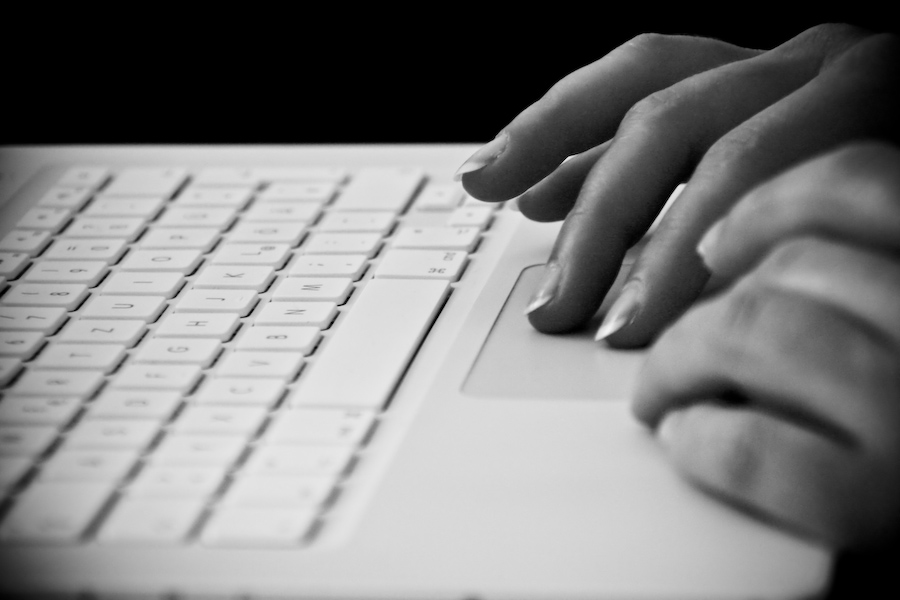 typing on laptop