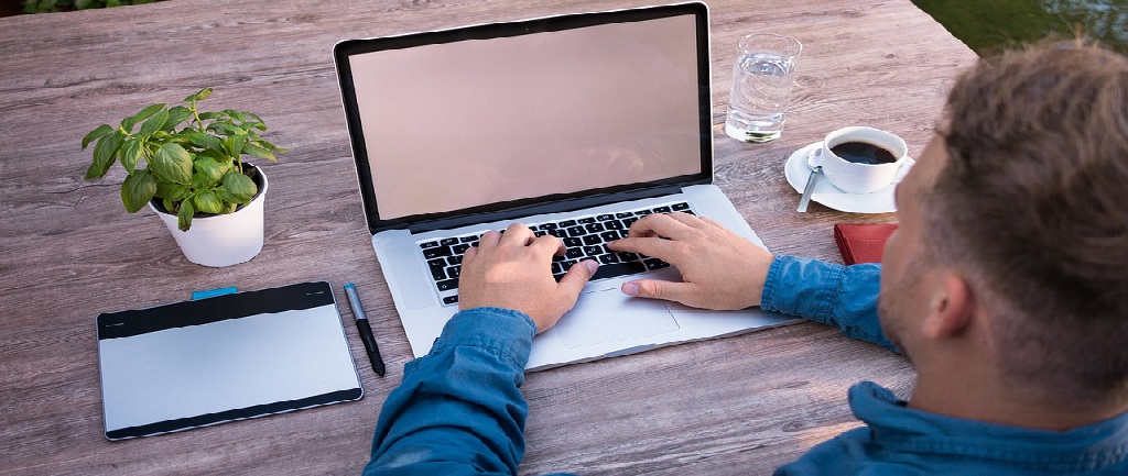 man working on laptop